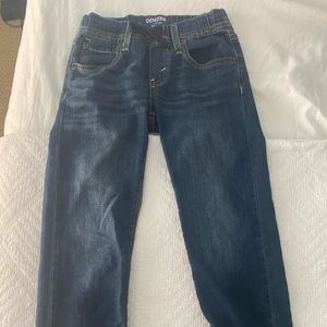 Three pairs of kids’ blue jeans